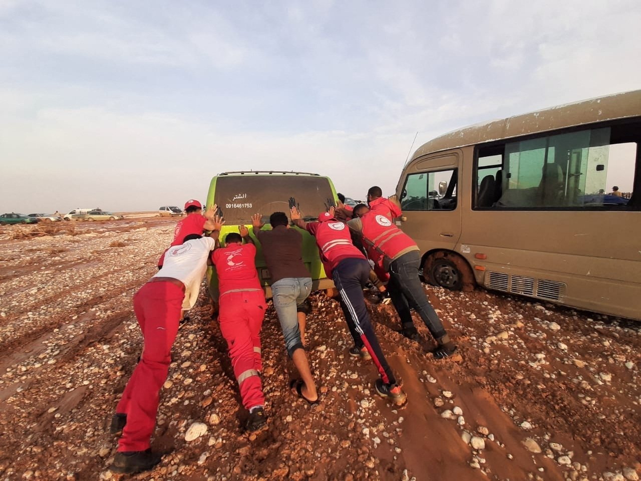 Libyan Red Crescent members work in an area affected by flooding, in Derna, Libya, Sept. 12, 2023. (Reuters Photo)