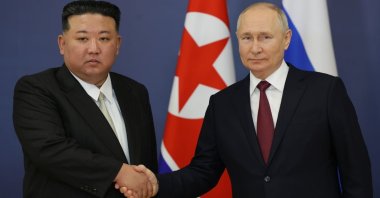 North Korean leader Kim Jong Un (L) shakes hand with President Vladimir Putin at the Vostochny Cosmodrome in Uglegorsk, Russia, Sept. 13, 2023. (IHA Photo)