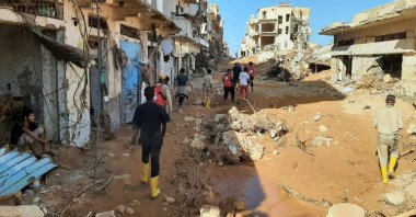 Libyan Red Crescent members work in an area affected by flooding, in Derna, Libya, Sept. 12, 2023. (Reuters Photo)