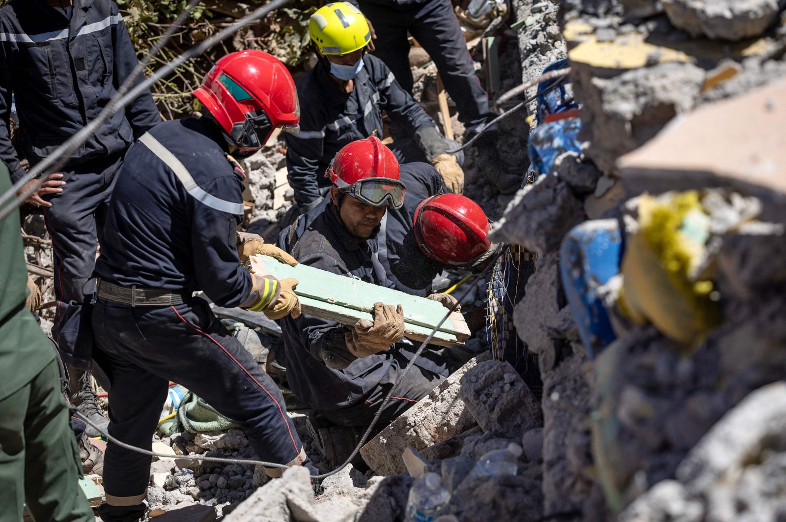 Moroccan and Spanish rescuers search the rubble for survivors in al-Haouz, Morocco, Sept. 11, 2023. (AFP Photo)