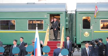 North Korean leader Kim Jong Un waves from his train following a reception hosted by Russia's President Vladimir Putin, in Russia, Sept. 13, 2023. (Reuters Photo)