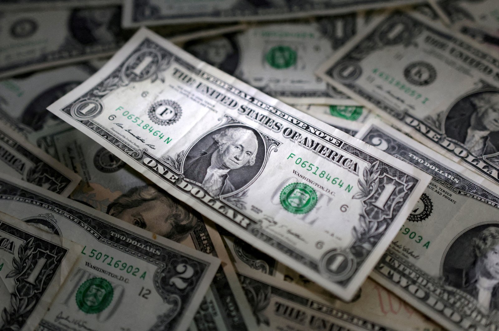 U.S. dollar banknotes depicted in an illustration taken on March 10, 2023. (Reuters Photo)