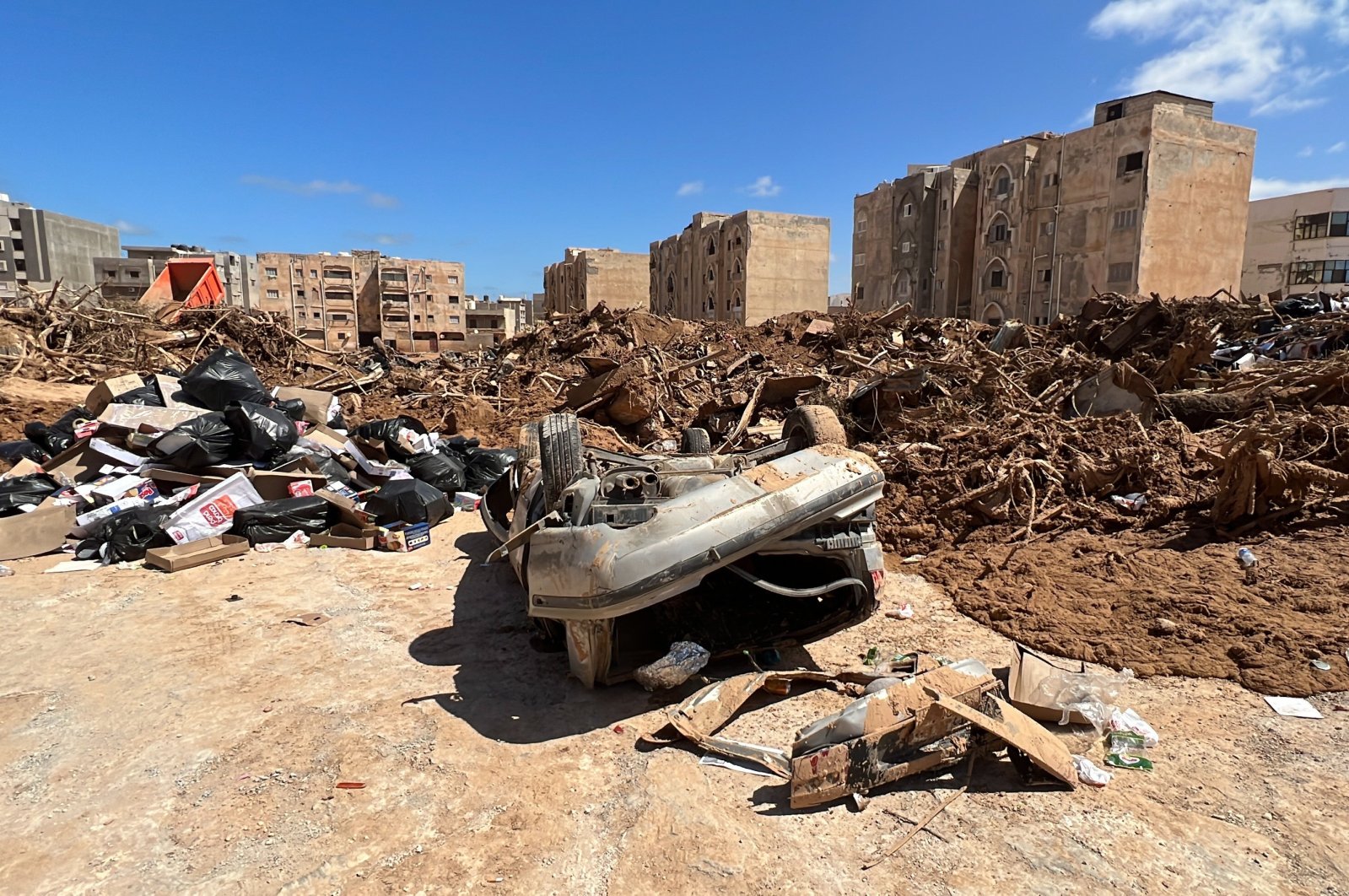 Damaged vehicles in the wake of Storm Daniel and the collapse of two dams that caused devastating floods and swept away entire neighborhoods, Derna, Libya, Sept. 14, 2023. (EPA Photo)