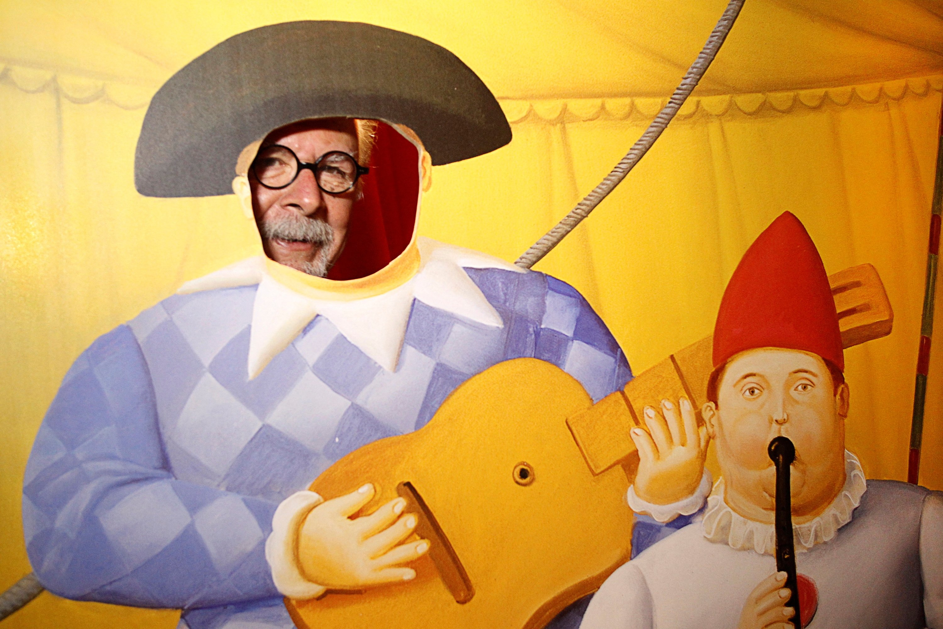 Colombian painter and sculptor Fernando Botero poses during the opening of his exhibition 