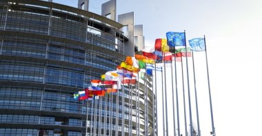 Flag line the walkway of the European Parliament building in Strasbourg, France, Sept. 13, 2023. (DHA Photo)