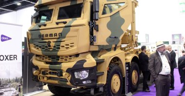 A DERMAN 8x8 armored logistic support vehicle is displayed at the Defence and Security Equipment International (DSEI) 2023, London, U.K., Sept. 14, 2023. (AA Photo)