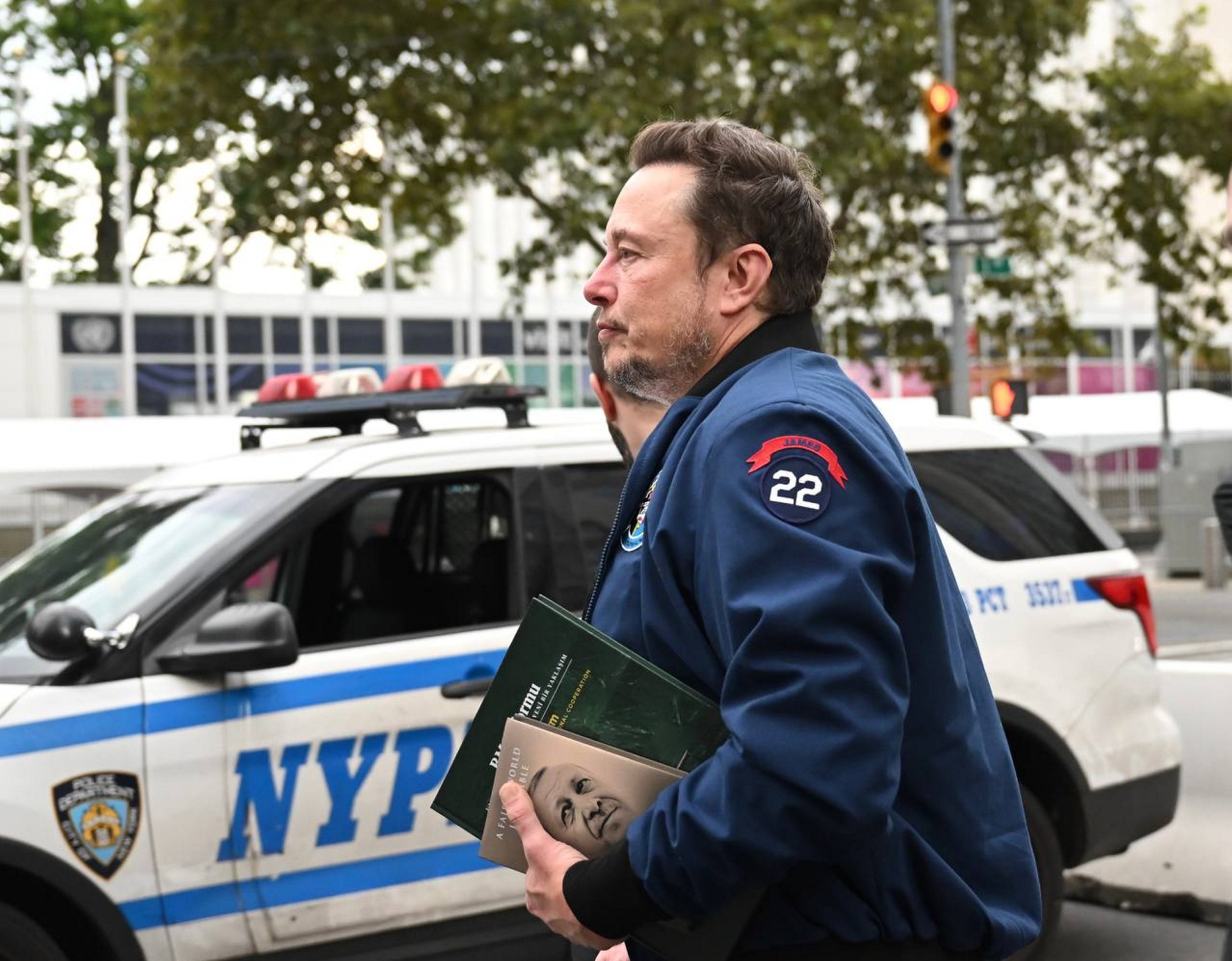 Tesla CEO Elon Musk is photographed leaving the Turkish House with books presented to him by President Recep Tayyip Erdoğan, New York, U.S., Sept. 17, 2023. (AA Photo)