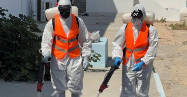 Volunteers disinfect the field hospital in the aftermath of the floods in Derna, Libya, Sept. 18, 2023. (Reuters Photo)