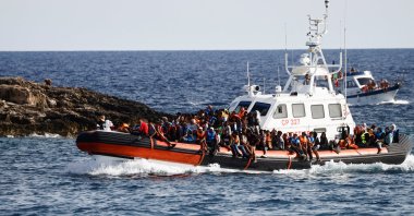 Migrants arrive on an Italian Coast Guard vessel after being rescued at sea, near the Sicilian island of Lampedusa, Italy, Sept. 18, 2023. (Reuters Photo)