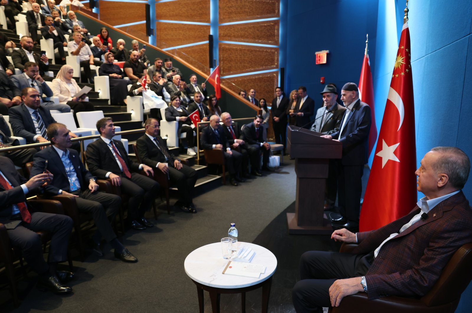 Ahıska Turk Mihrali Mametoğlu speaks as President Recep Tayyip Erdoğan (R) listens during the event in New York, United States, Sept. 17, 2023. (IHA Photo)