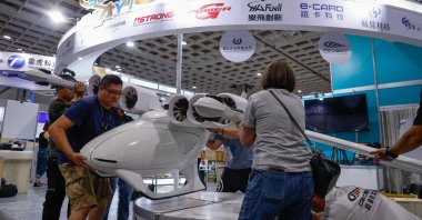 Staff members put a Jackal drone on display before the opening of the 2023 Taipei Aerospace and Defense Technology Exhibition at the Nangang Exhibition Center in Taipei, Taiwan, Sept. 13, 2023. (Reuters Photo)