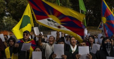 Exile Tibetan activists hold blank white papers symbolizing government censorship in China, while shouting anti-China slogans during a protest in New Delhi, India, Dec. 2, 2022. (AP Photo)