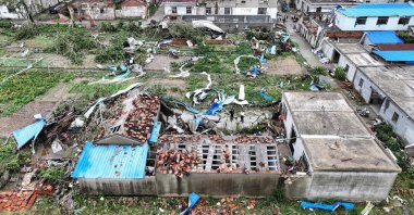 An aerial view of damaged buildings after a tornado hit the city of Suqian, eastern China, Sept. 20, 2023. (AFP Photo)