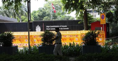 An Indian policeman patrols in front of the Canadian embassy in New Delhi, India, Sept. 19, 2023. (EPA Photo)