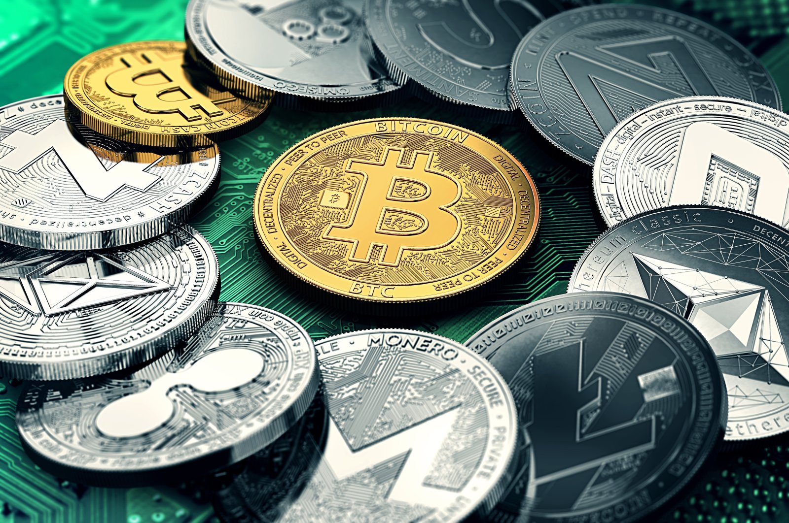 The representation of cryptocurrencies is seen in a circle with a golden Bitcoin in the middle. (Shutterstock Photo)