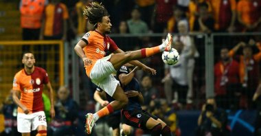 Galatasaray&#039;s Sacha Boey jumps to kick the ball during the UEFA Champions League Group A between Galatasaray and FC Copenhagen at the Rams Park stadium, Istanbul, Türkiye, Sept. 20, 2023. (AFP Photo)