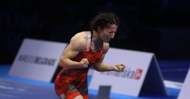 Turkish wrestler Evin Demirhan Yavuz celebrates after defeating Colombia&#039;s Alisson Cardozo during the 2023 World Wrestling Championships, Belgrade, Serbia, Sept. 20, 2023. (AA Photo)