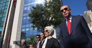 President Recep Tayyip Erdoğan, accompanied by first lady Emine Erdoğan, walks outside Turkish House, in New York, U.S., Sept. 19, 2023. (AA Photo)