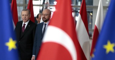 President Recep Tayyip Erdoğan walks with European Council President Charles Michel (R) prior to a meeting at the European Council building in Brussels, Belgium, March 9, 2020. (AP Photo)