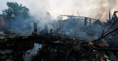 A firefighter works at a site in a residential area, damaged during a Russian missile strike, amid Russia’s attack on Ukraine, in Kyiv, Ukraine, Sept. 21, 2023. (Reuters Photo)