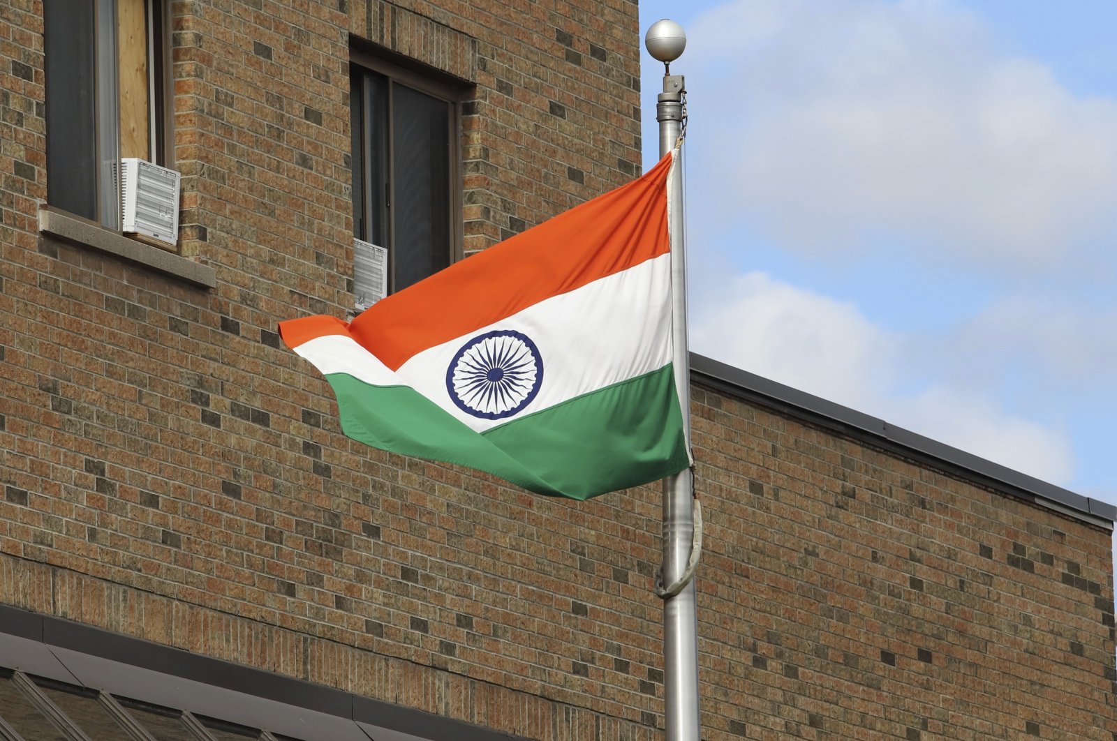 The Indian flag is seen flying at the High Commission of India in Ottawa, Canada, Sept. 20, 2023. (AP Photo)