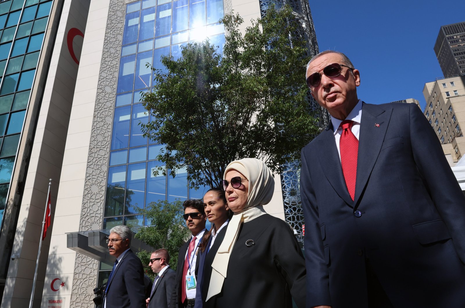 President Recep Tayyip Erdoğan, accompanied by first lady Emine Erdoğan, walks outside Turkish House, in New York, U.S., Sept. 19, 2023. (AA Photo)