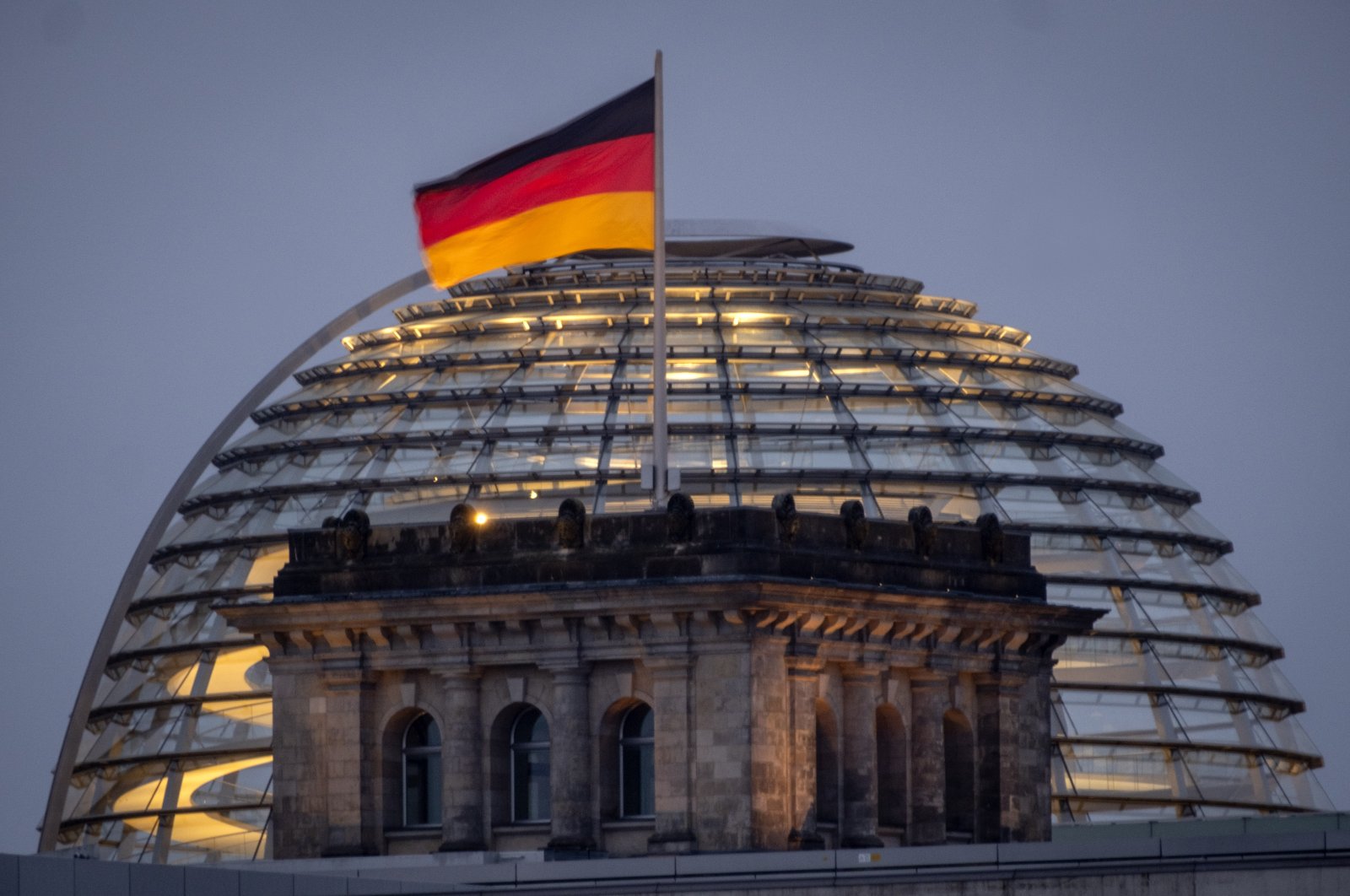 The German national flag waves on top of the Reichtstag building in Berlin, Germany, Aug. 31, 2023. (AP Photo)