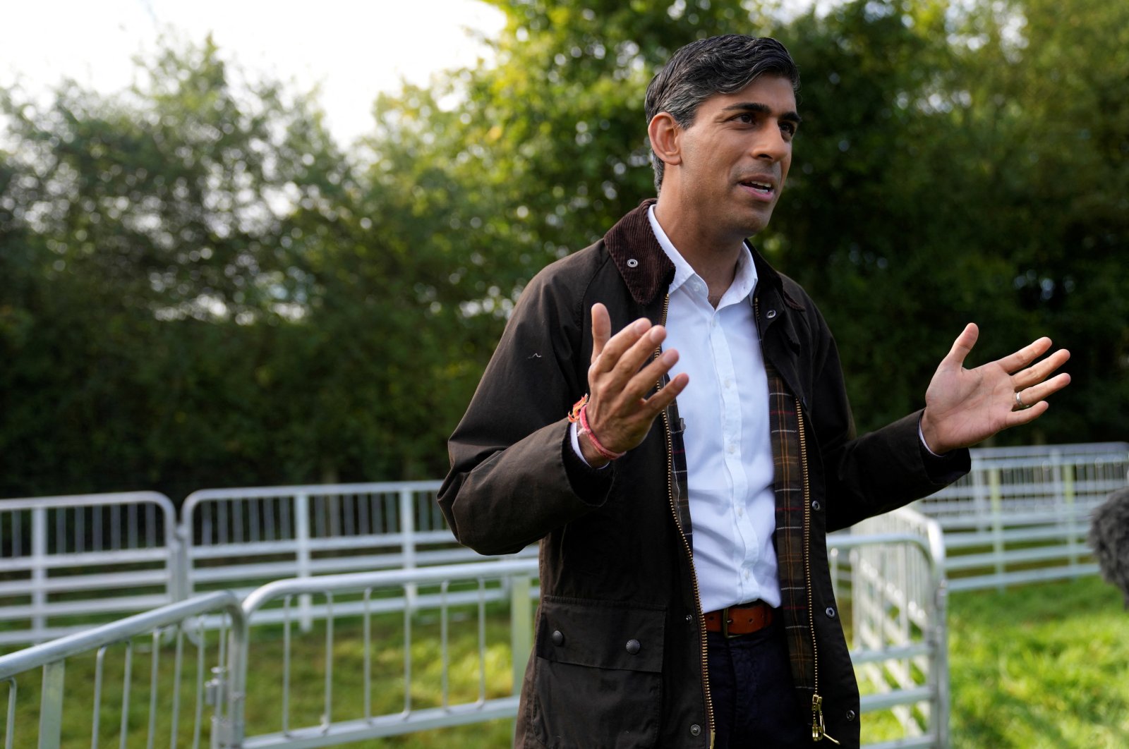 Britain&#039;s Prime Minister Rishi Sunak gestures as he speaks to apprentices, during a visit to Writtle University College, in Writtle, near Chelmsford, U.K., Sept. 21, 2023. (Reuters Photo)