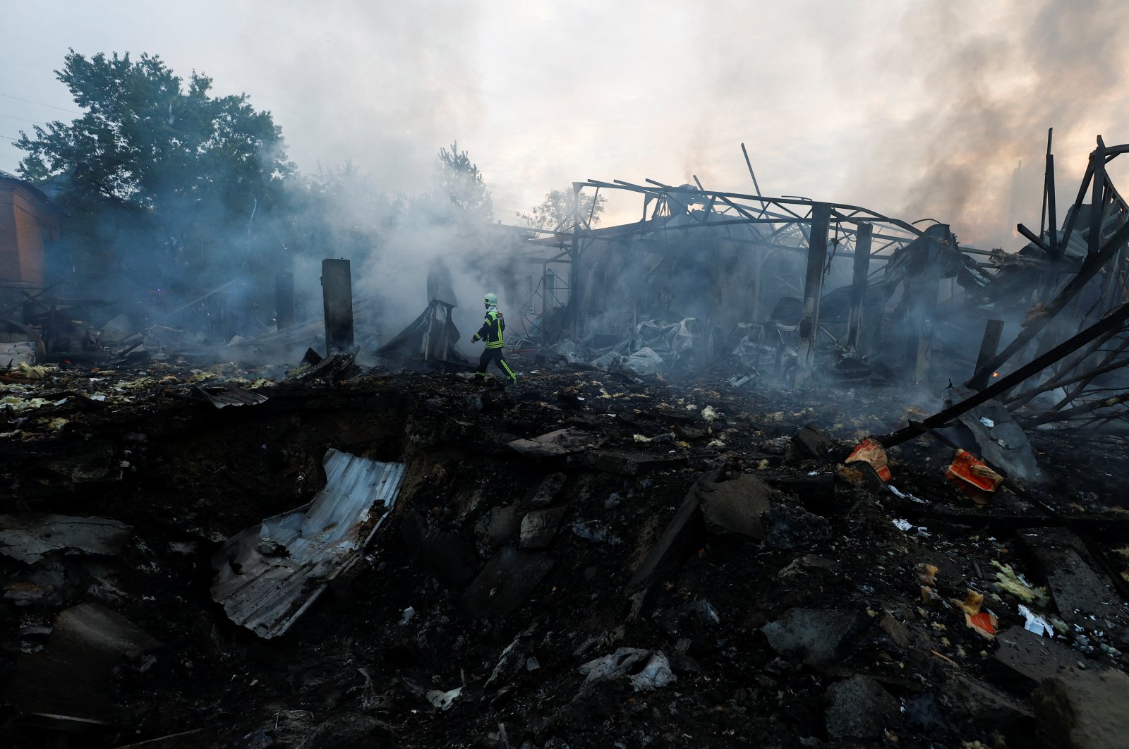 A firefighter works at a site in a residential area, damaged during a Russian missile strike, amid Russia’s attack on Ukraine, in Kyiv, Ukraine, Sept. 21, 2023. (Reuters Photo)