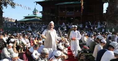 A Kashmiri man sprays rose water during prayers at the shrine of Sufi Saint Naqashband Sahib, Srinagar, Indian Kashmir, Sept. 20, 2023. (EPA Photo)