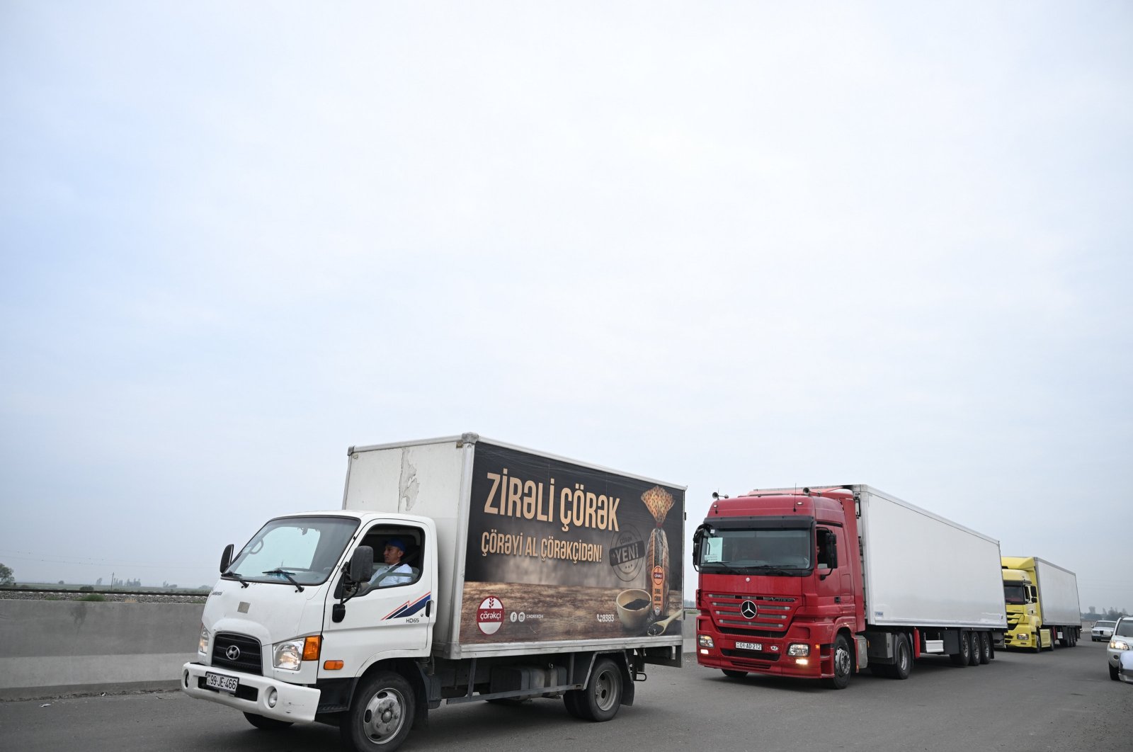 Trucks carry humanitarian aid in Aghdam, Azerbaijan, Sept. 22, 2023. (AA Photo)