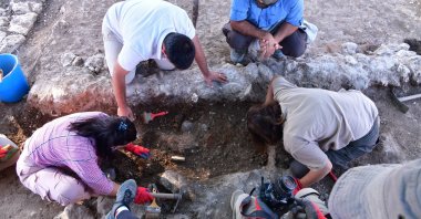 Archaelogists are seen during excavations at the ancient city of Aizanoi in Kütahya Türkiye, in this photo released on Sept. 23, 2023. (AA. Photo)