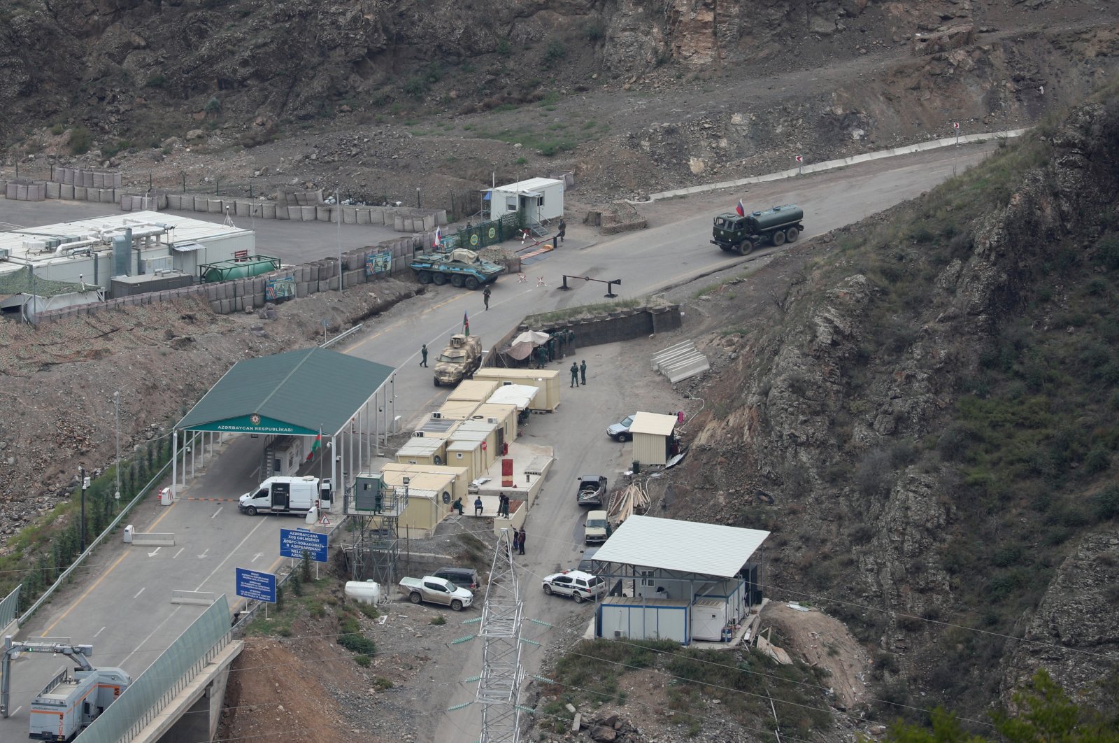 A view shows a border-crossing point on the frontier between Armenia and Azerbaijan and a base of Russian peacekeepers deployed in Karabakh as seen from a road near the village of Kornidzor, Armenia, Sept. 23, 2023. (Reuters Photo)