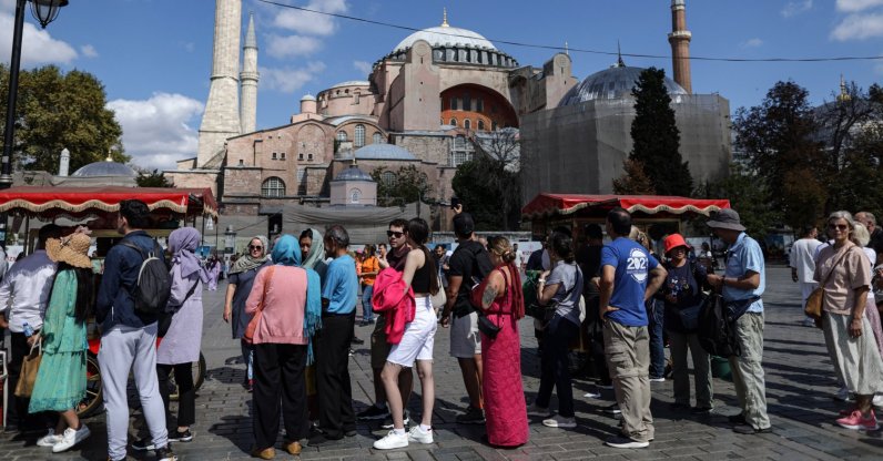 Tourists wait in line to enter the Hagia Sophia Grand Mosque in Istanbul, Türkiye, Sept. 16, 2023. (EPA Photo)
