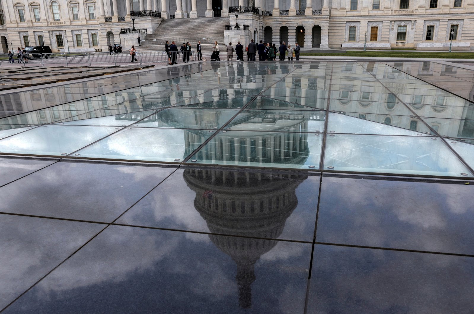 The U.S. Capitol dome is seen in a reflection outside the United States Capitol building in Washington, U.S., Sept. 22, 2023. (Reuters Photo)