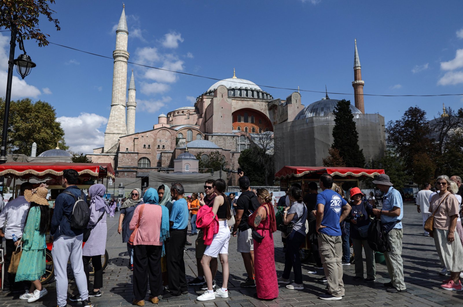 Tourists wait in line to enter the Hagia Sophia Grand Mosque in Istanbul, Türkiye, Sept. 16, 2023. (EPA Photo)