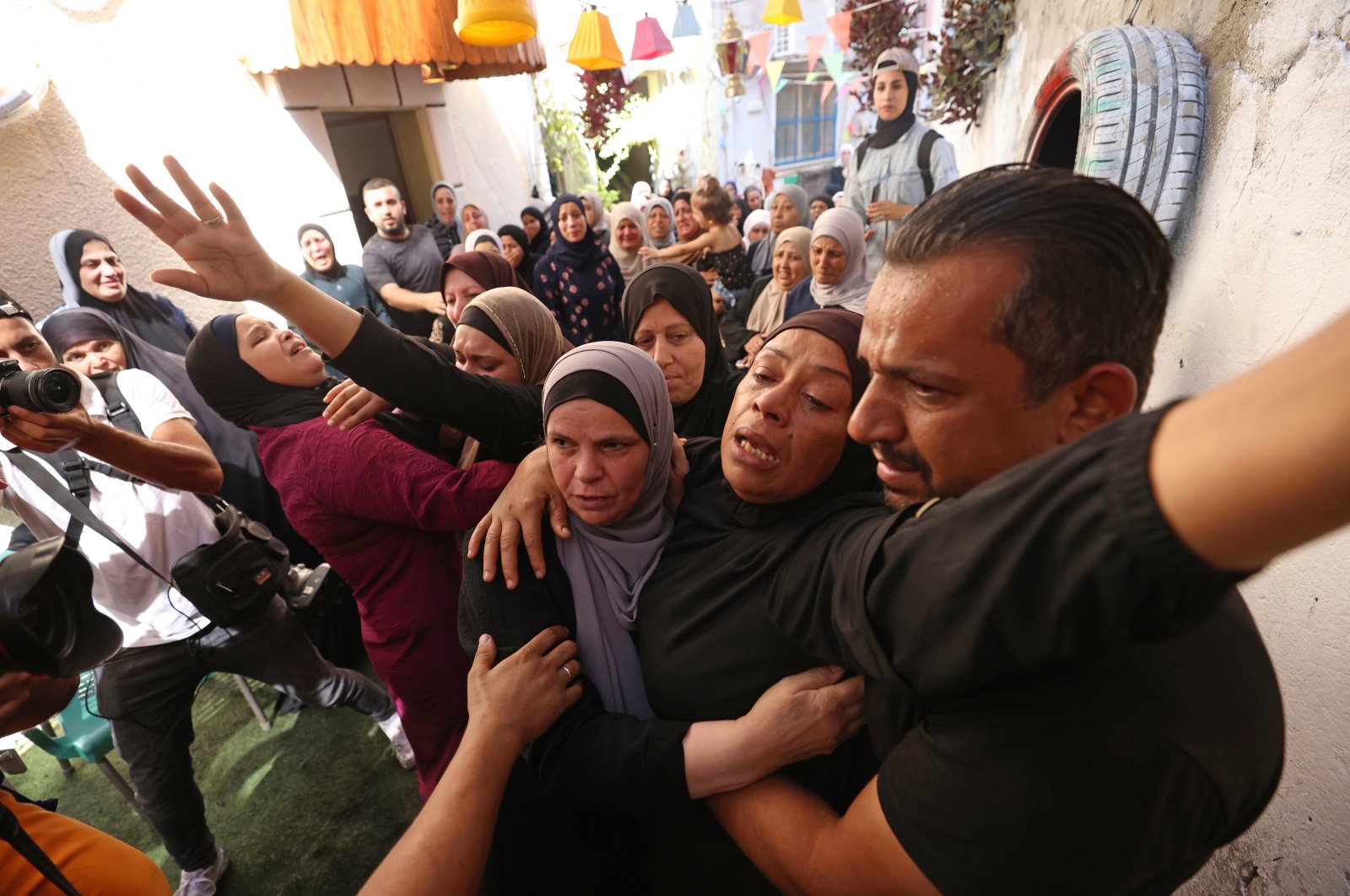 Relatives of killed Palestinian Abed Al Rahman Abu Daghash, 32, wail during his funeral procession, Tulkarem, occupied West Bank, Palestine, Sept. 24, 2023. (EPA Photo)