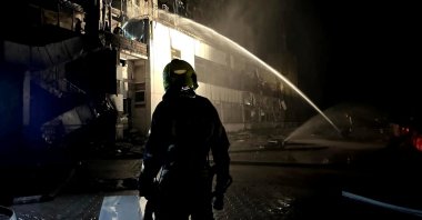 Firefighters work at a site of a hotel damaged by a Russian military attack, in Odesa, Ukraine, Sept. 25, 2023. (Reuters Photo)