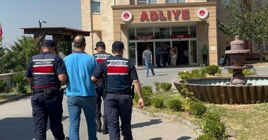 Gendarmerie forces escort a fugitive convicted for being a Gülenist Terror Group (FETÖ) member to the courthouse in eastern Kahramanmaraş province, Türkiye, Sept. 22, 2023. (AA Photo)
