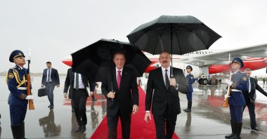President Recep Tayyip Erdoğan (L) walks with Azerbaijani President Ilham Aliyev at a welcoming ceremony, Nakhchivan, Azerbaijan, Sept. 25, 2023. (DHA Photo)