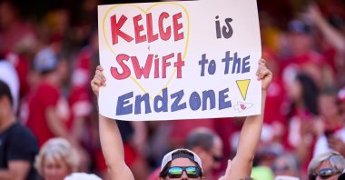 A fan holds a sign supporting Taylor Swift and Travis Kelce as the Kansas City Chiefs play the Chicago Bears during the first half at GEHA Field at Arrowhead Stadium, Missouri, U.S., Sept. 24, 2023. (Getty Images Photo)