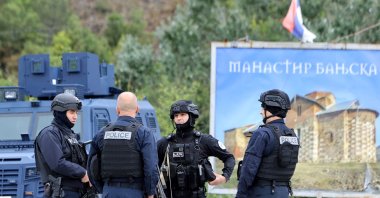 Armed Kosovo police officers control the road near the village of Banjska, Kosovo, Sept. 25, 2023. ()