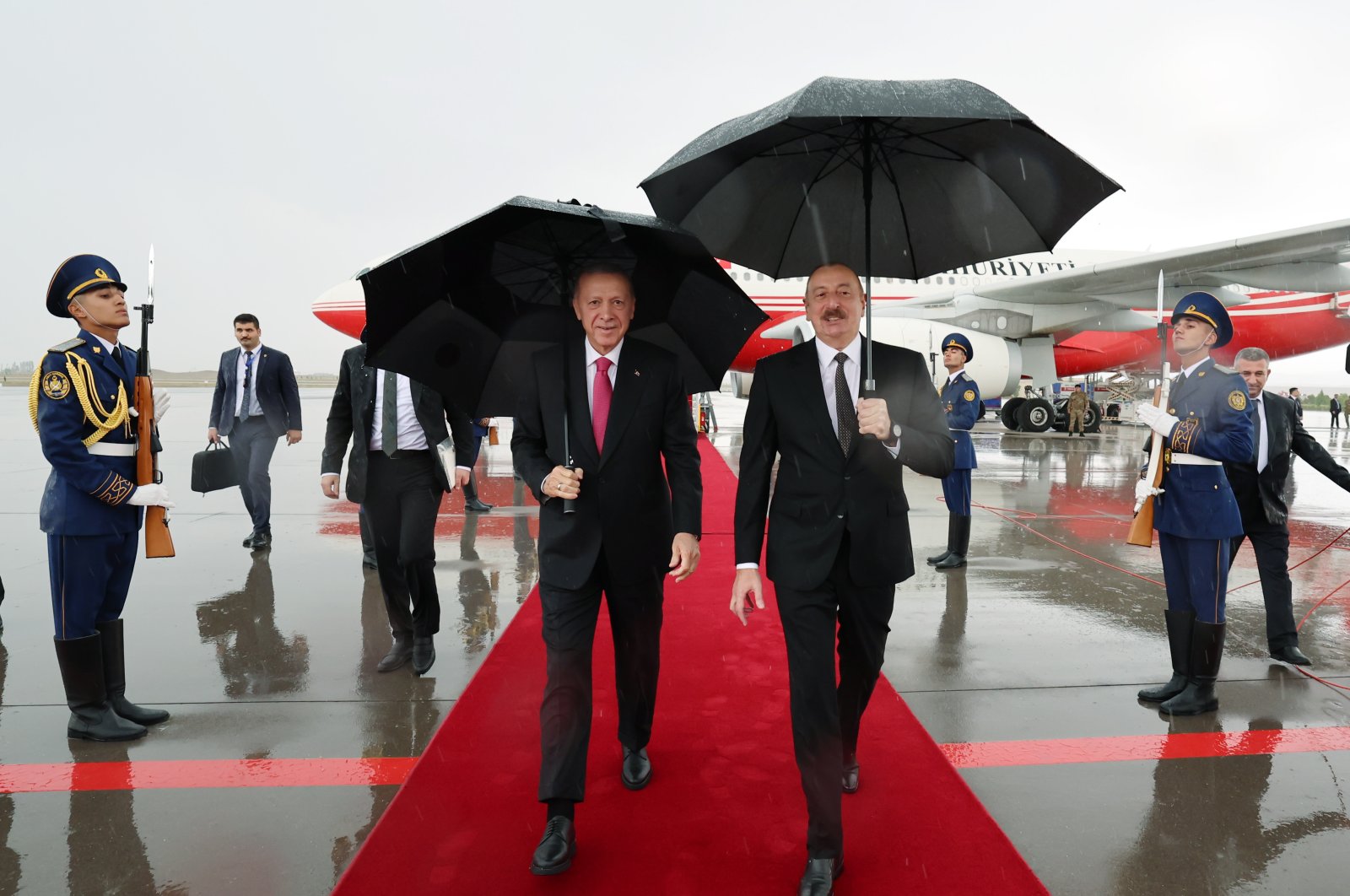 President Recep Tayyip Erdoğan (L) walks with Azerbaijani President Ilham Aliyev at a welcoming ceremony, Nakhchivan, Azerbaijan, Sept. 25, 2023. (DHA Photo)