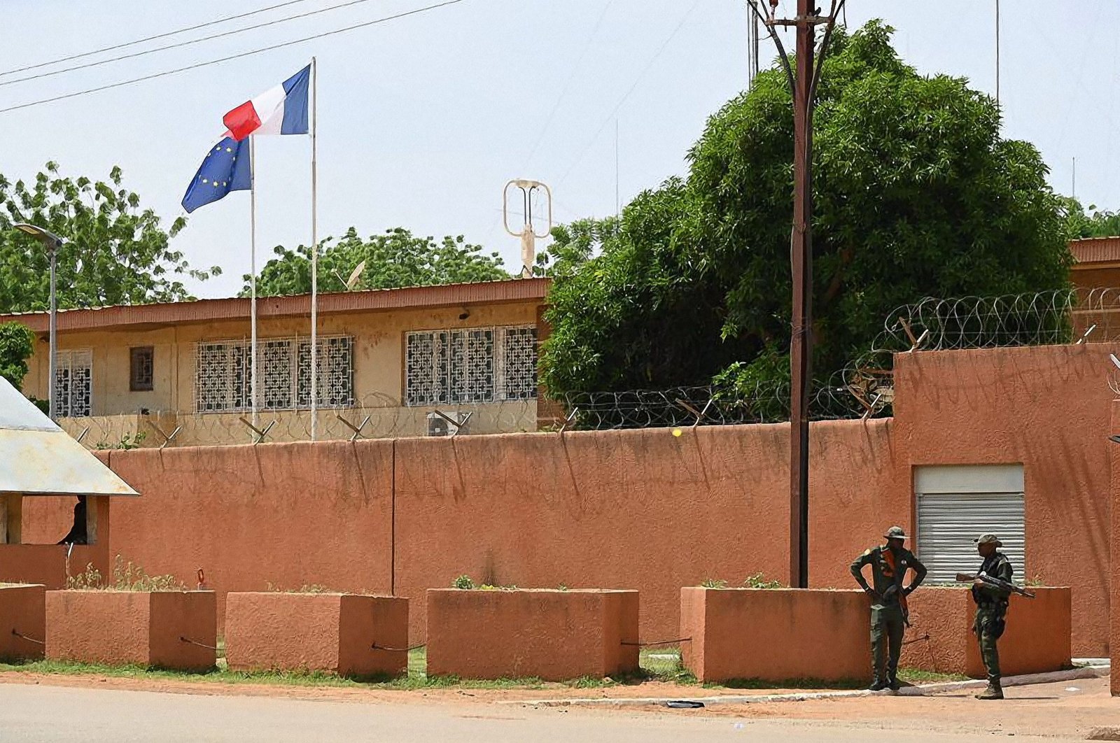 Niger police officers are seen outside the French Embassy in Niamey, Niger, Aug. 28, 2023. (AFP Photo)