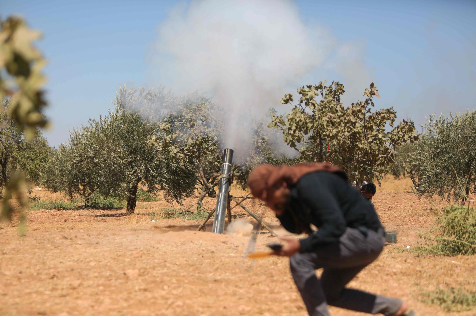 Fighters of Turkish-supported opposition forces are positioned on the Buwayhij-Boughaz-Korhoyuk front line as they fight with the PKK/YPG terrorists on the outskirts of Manbij, northeastern Syria, Sept. 6, 2023. (AFP Photo)