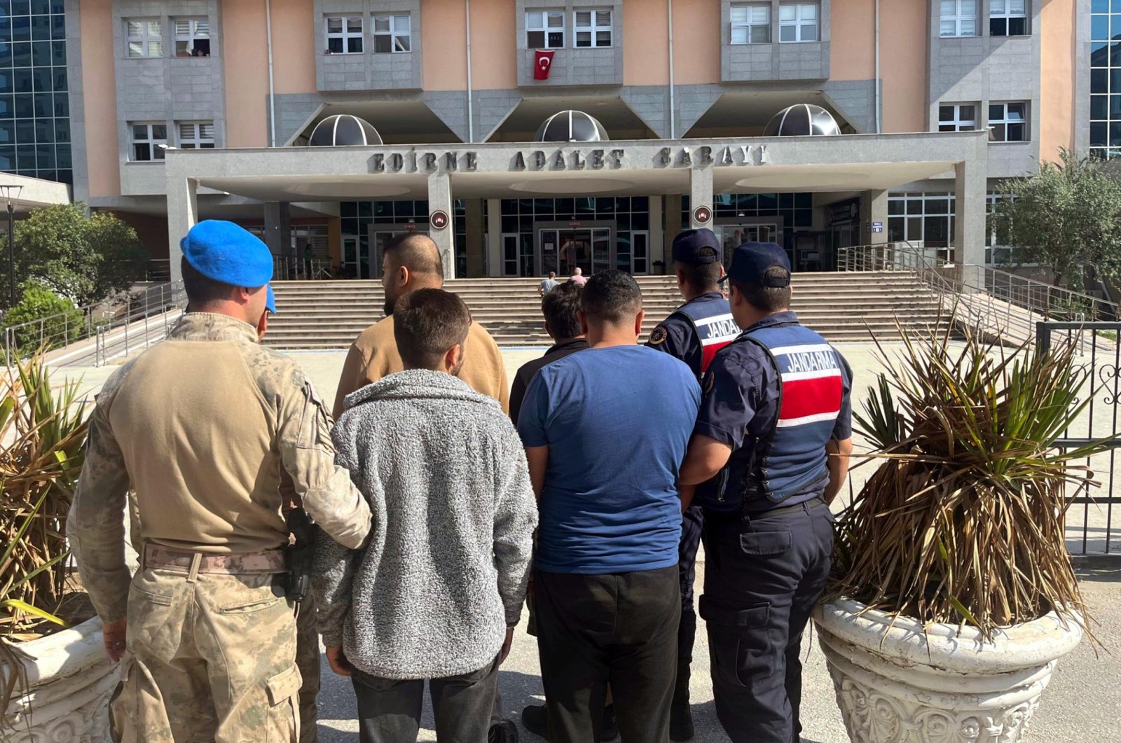 Gendarmerie officers escort FETÖ suspects attempting to flee Türkiye, in Edirne, northwestern Türkiye, Sept. 21, 2023. (DHA Photo)