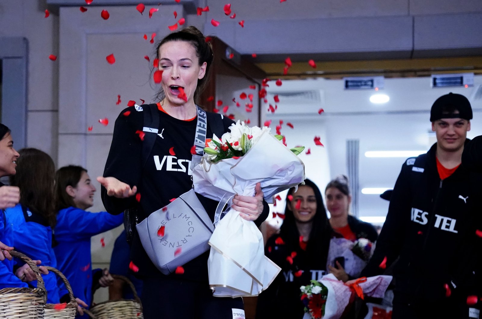 Turkish &quot;Sultans of the Net&quot; team captain Eda Erdem Dündar is showered with rose petals upon the team&#039;s return from Japan, Istanbul, Türkiye, Sept. 25, 2023. (IHA Photo)