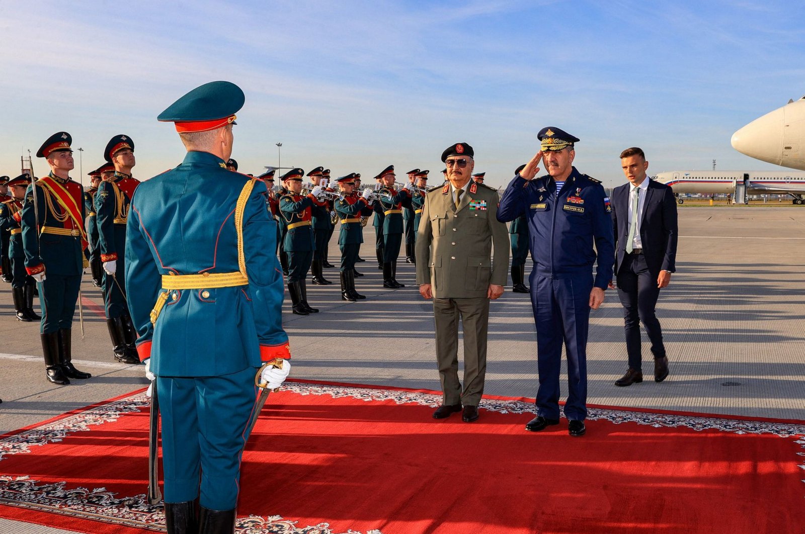 A handout picture from Haftar&#039;s self-proclaimed Libyan National Army&#039;s General Command&#039;s Facebook page, shows him (C) during a reception ceremony attended by Russia&#039;s Deputy Defense Minister Yunus-bek Yevkurov (2R) at a Moscow military airfield on Sept. 26, 2023. (AFP Photo)