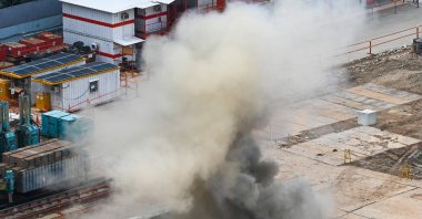 Smoke rises after a 100-kilogram World War II-era aerial bomb is detonated at a construction site in Singapore, Sept. 26, 2023. (AFP Photo)