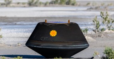 The return capsule containing a sample collected from the asteroid Bennu in October 2020 by NASA’s OSIRIS-REx spacecraft is seen shortly after touching down in the desert at the Department of Defense&#039;s Utah Test and Training Range in Dugway, Utah, U.S., Sept. 24, 2023. (Reuters Photo)